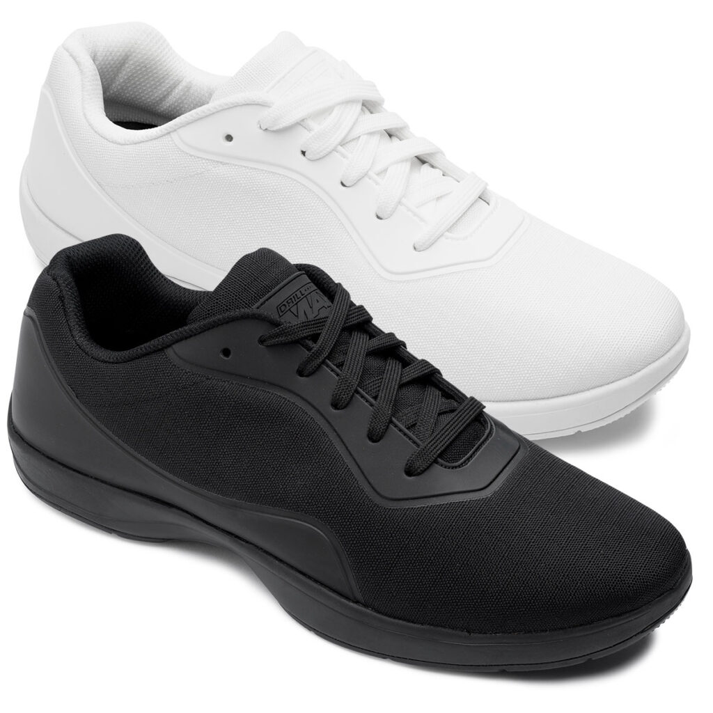 black and white DrillMax marching shoes side by side, front three-quarters view